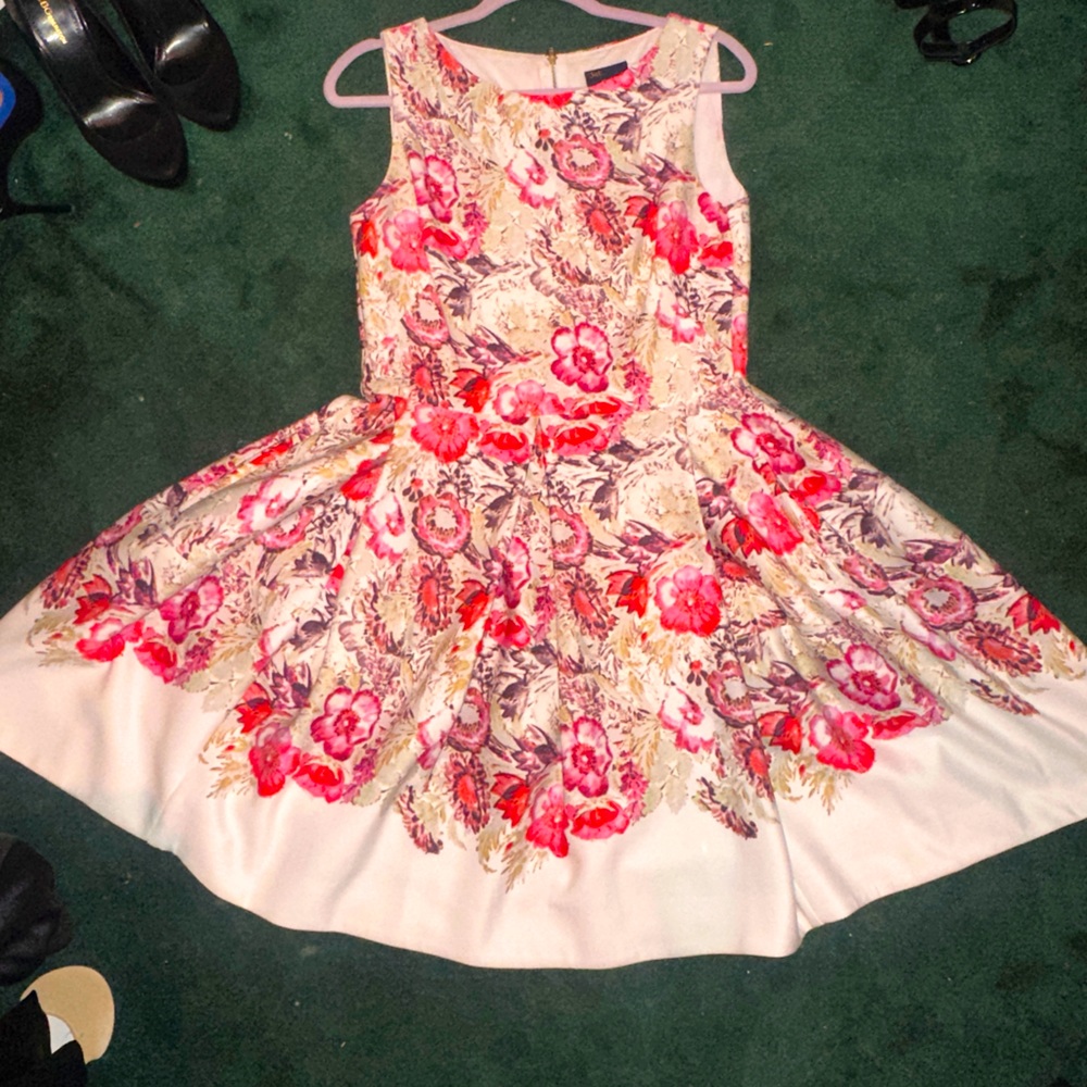 Just Taylor purchased from Nordstrom very beautiful buoyant fabric. Classic cut.